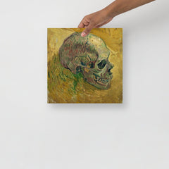 A Skull 1887 by Vincent Van Gogh poster on a plain backdrop in size 12x12”.