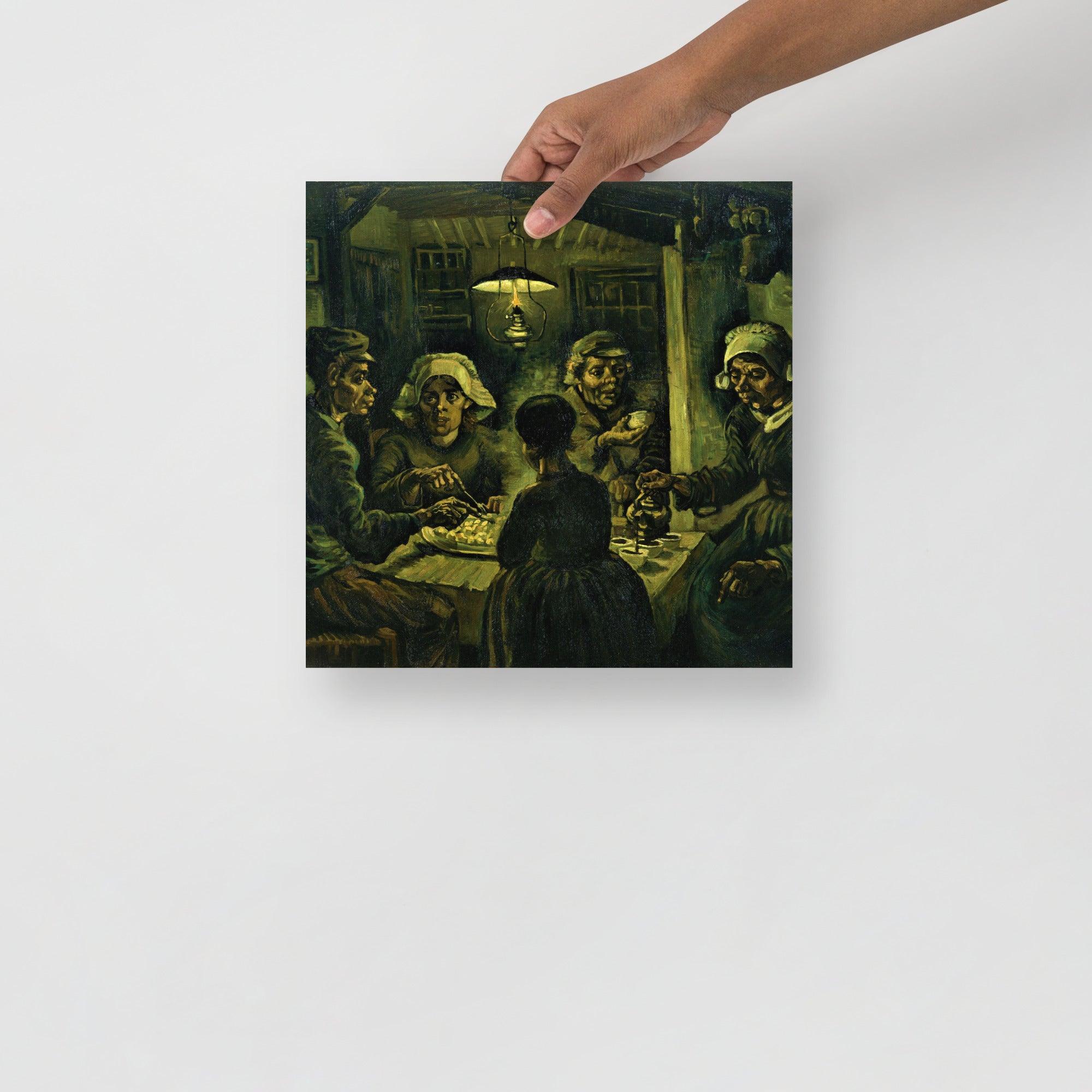 The Potato Eaters by Vincent van Gogh poster on a plain backdrop in size 12x12”.