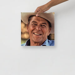 A Ronald Reagan Cowboy Hat poster on a plain backdrop in size 12x12”.