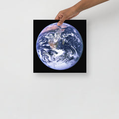 The Blue Marble poster on a plain backdrop in size 12x12”.