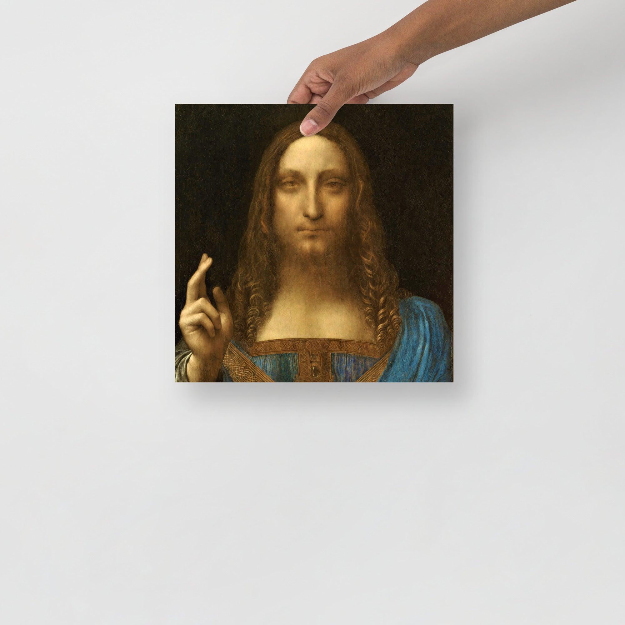 A Salvator Mundi by Leonardo Da Vinci poster on a plain backdrop in size 12x12”.