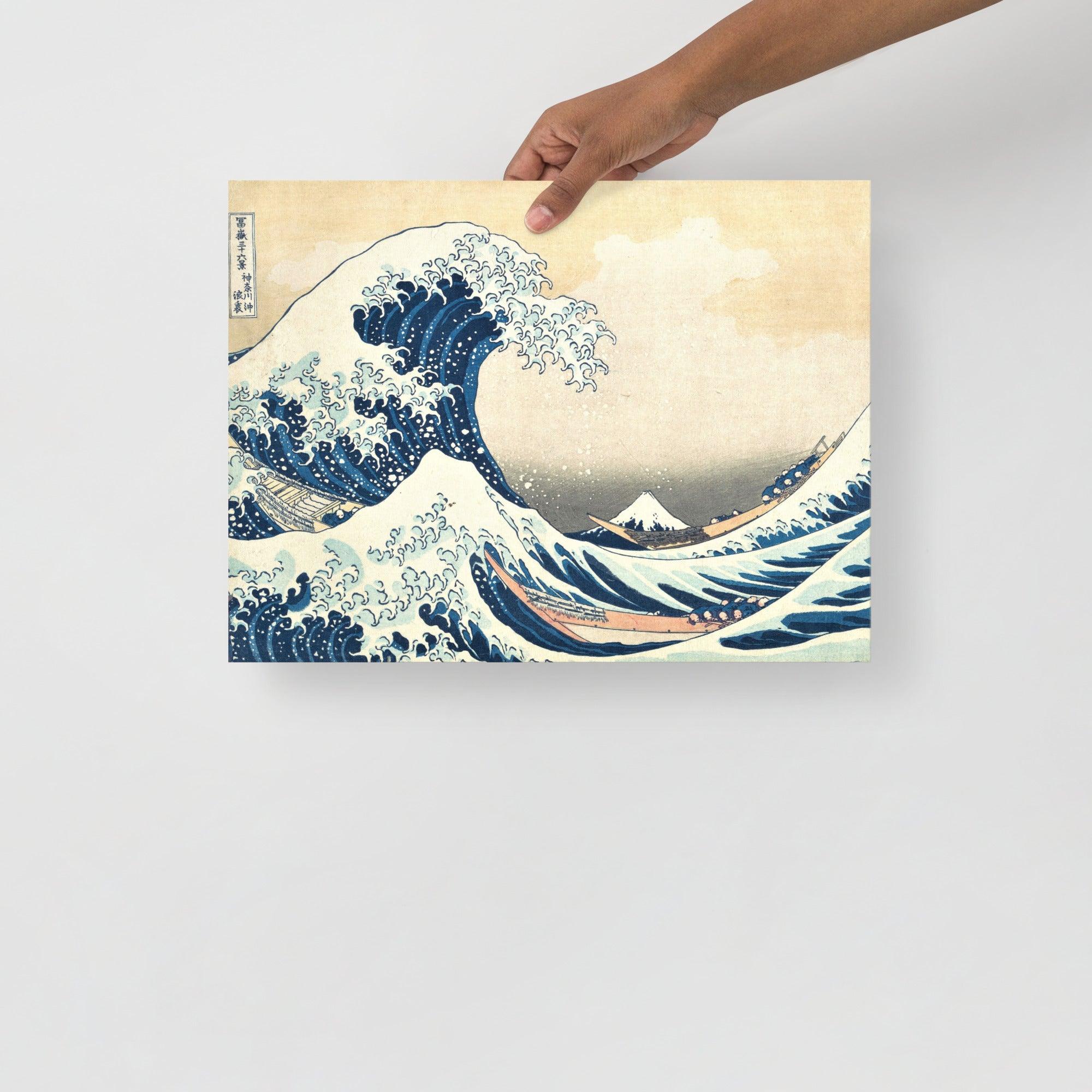The Great Wave off Kanagawa by Hokusai poster on a plain backdrop in size 12x16”.