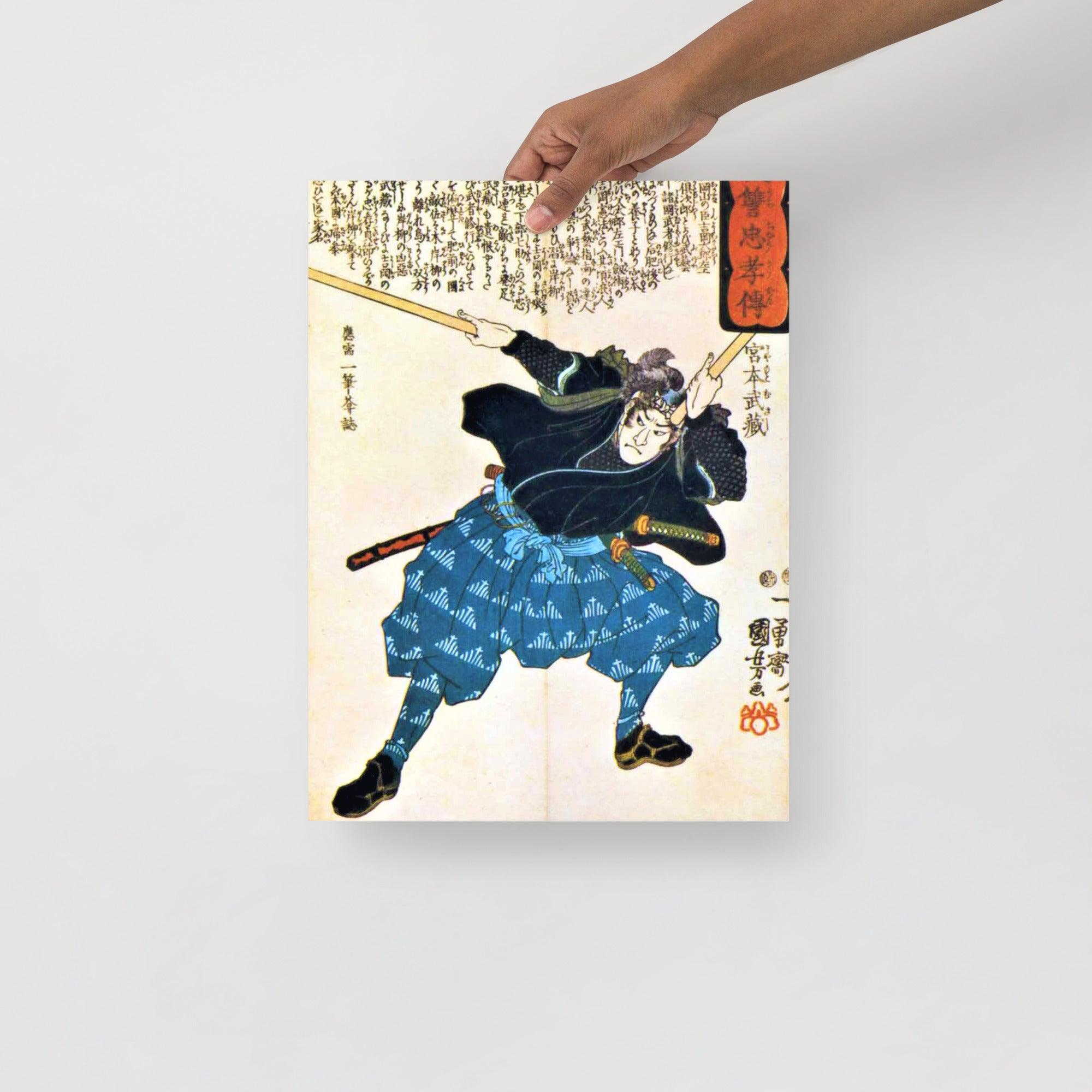 A Miyamoto Musashi by Utagawa Kuniyoshi poster on a plain backdrop in size 12x16”.