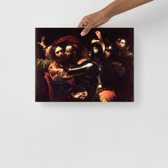 The Taking of Christ by Caravaggio poster on a plain backdrop in size 12x16”.