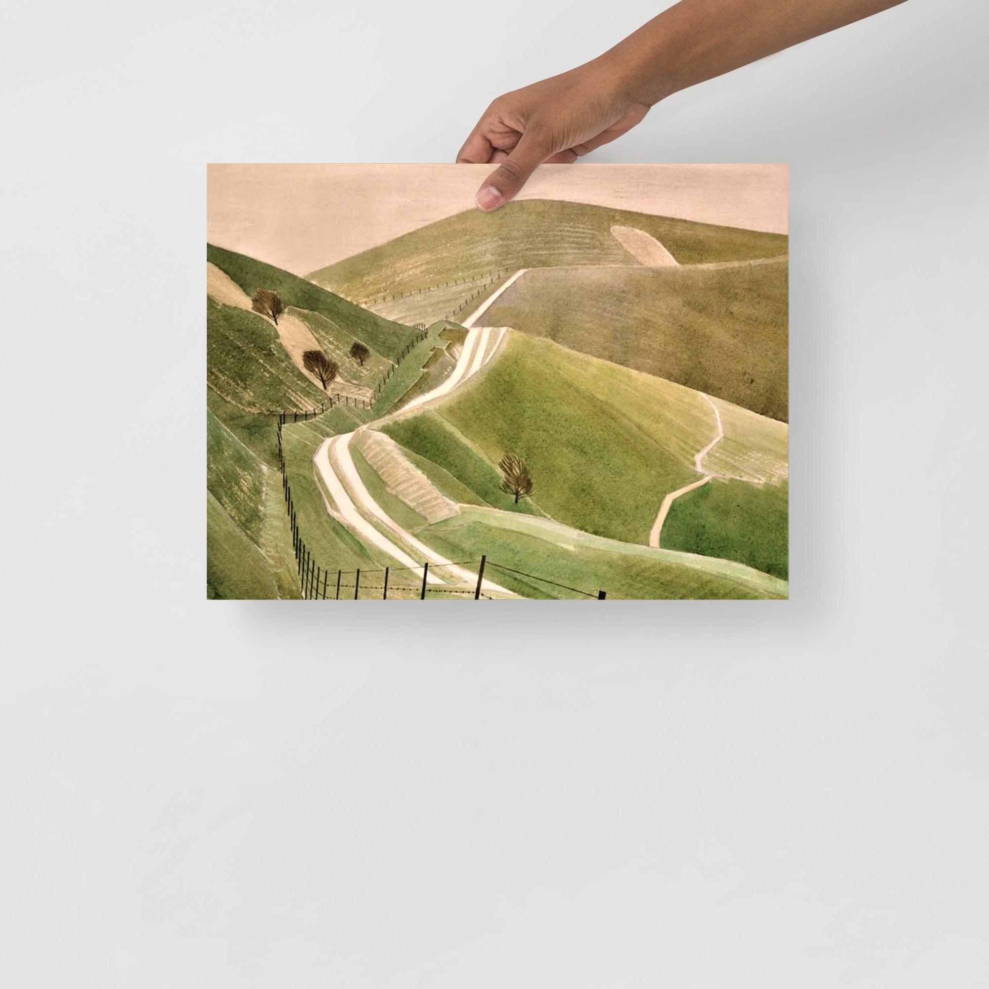 A Chalk Paths by Eric Ravilious poster on a plain backdrop in size 12x16”.