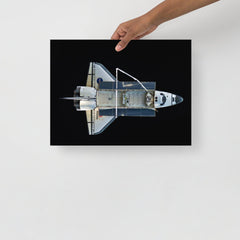 A Space Shuttle Atlantis poster on a plain backdrop in size 12x16”.