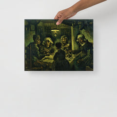 The Potato Eaters by Vincent van Gogh poster on a plain backdrop in size 12x16”.