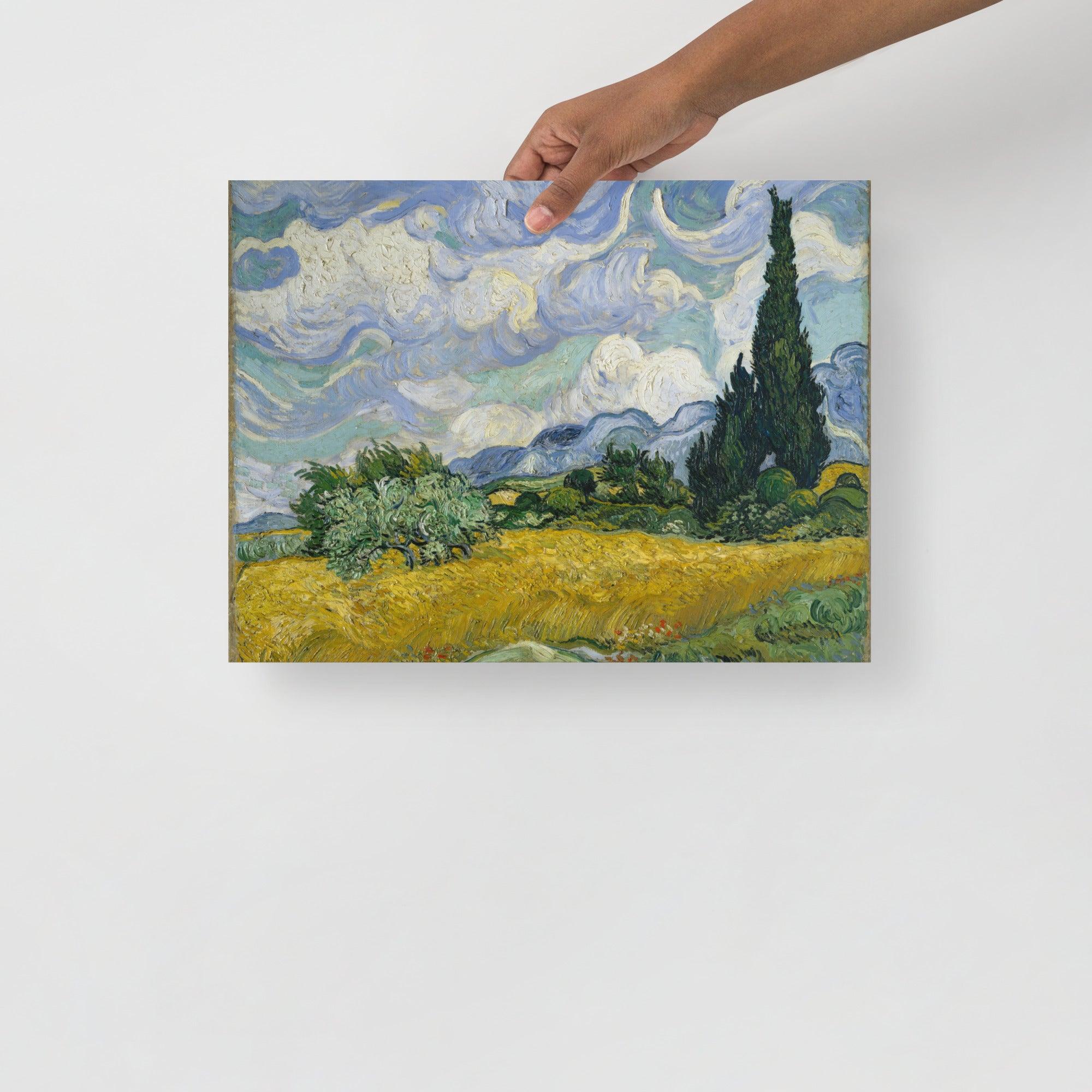 A Wheat Field with Cypresses by Vincent van Gogh poster on a plain backdrop in size 12x16”.
