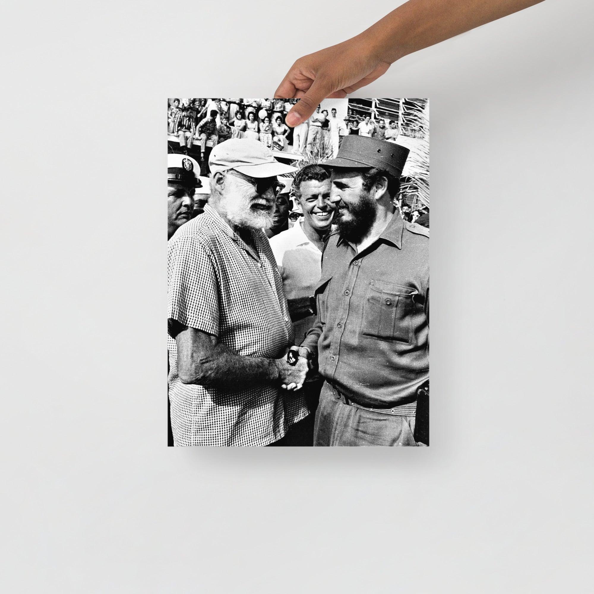 An Ernest Hemingway with Fidel Castro poster on a plain backdrop in size 12x16”.