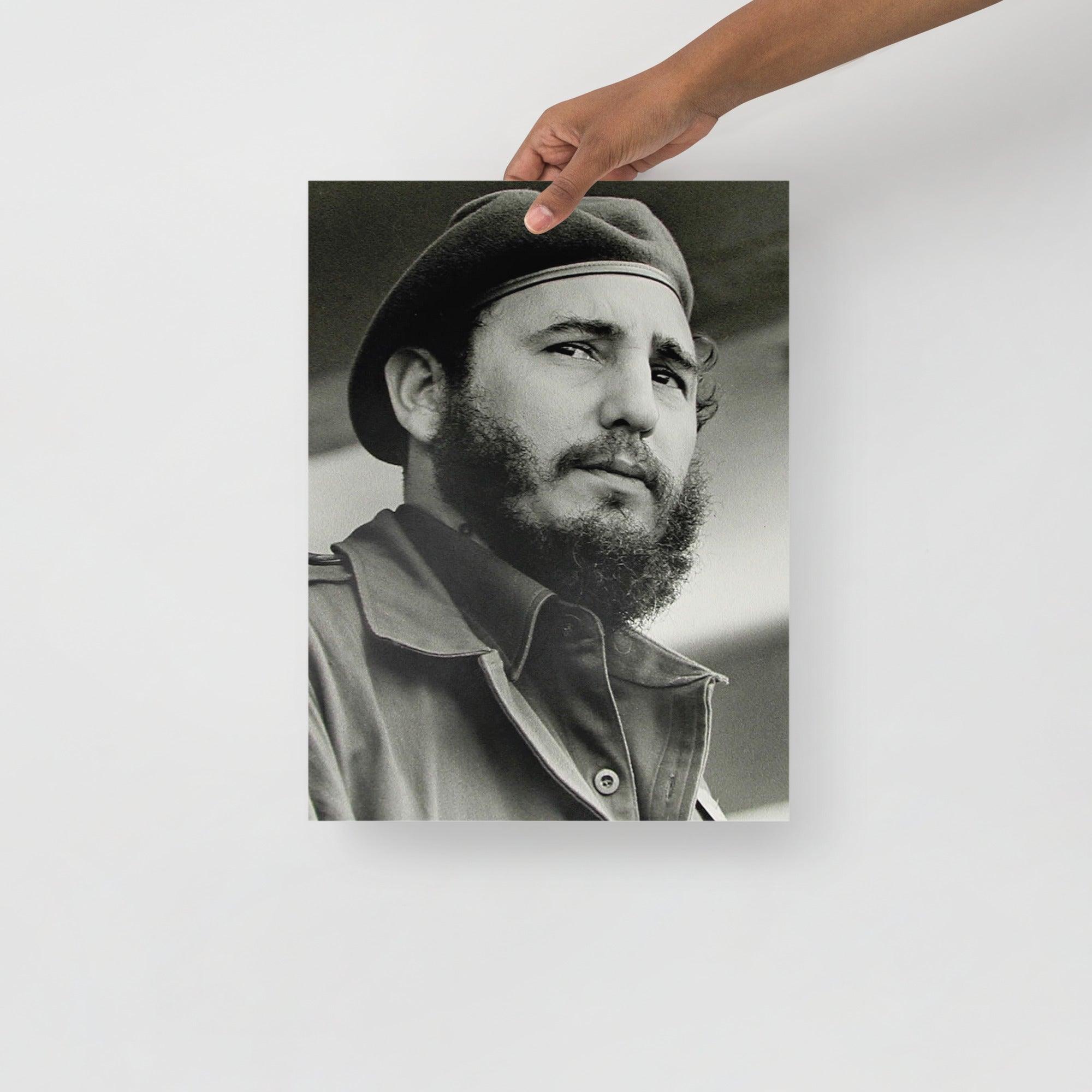 A Fidel Castro poster on a plain backdrop in size 12x16”.