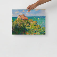 A Fisherman's Cottage at Varengeville by Claude Monet poster on a plain backdrop in size 12x16”.