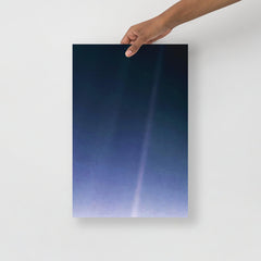 A Pale Blue Dot poster on a plain backdrop in size 12x18”.