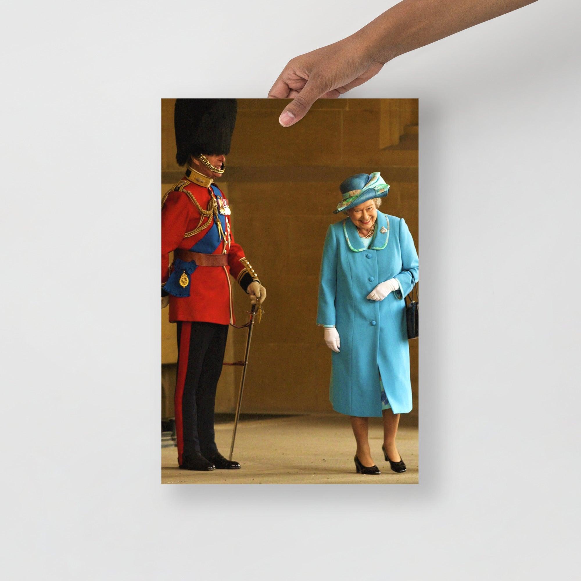 A Queen Elizabeth II with Prince Philip poster on a plain backdrop in size 12x18”.