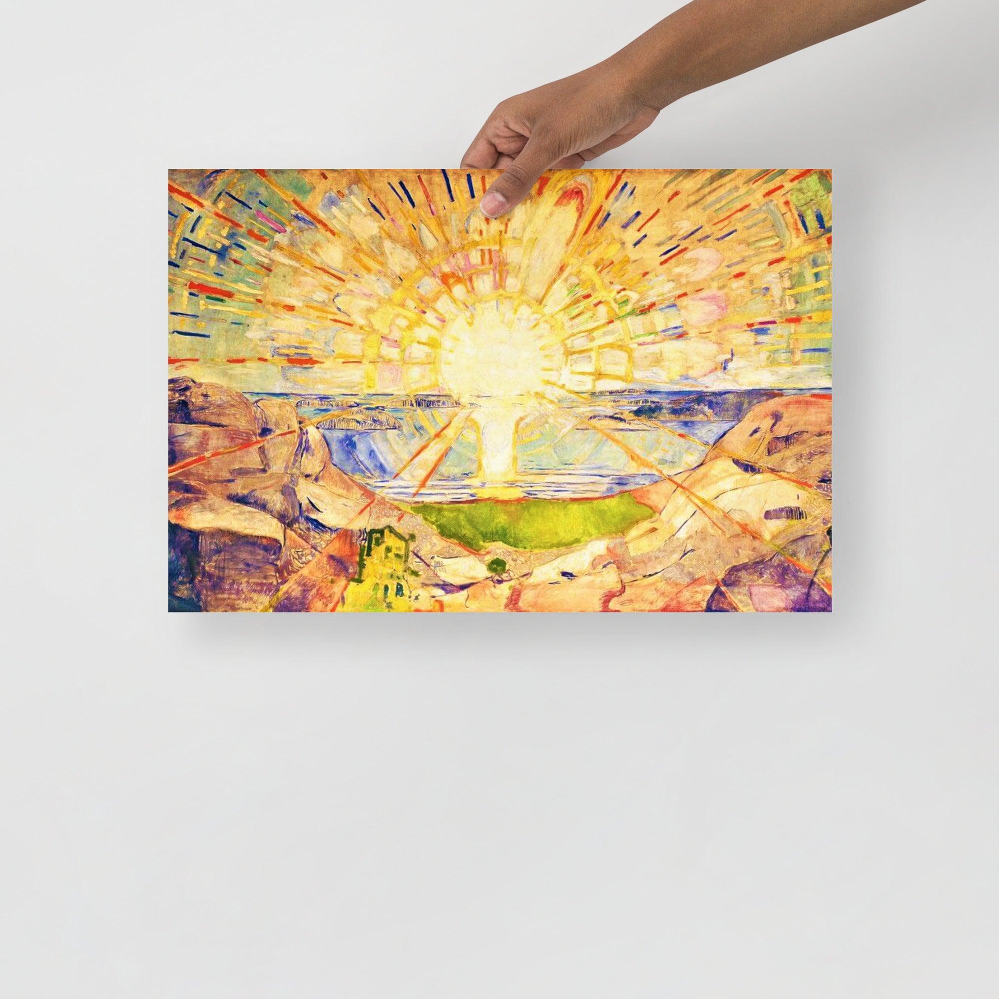 The Sun By Edvard Munch poster on a plain backdrop in size 12x18”.