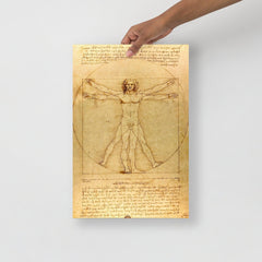 A Vitruvian Man by Leonardo da Vinci poster on a plain backdrop in size 12x18”.