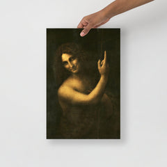 A Saint John the Baptist by Leonardo da Vinci poster on a plain backdrop in size 12x18”.