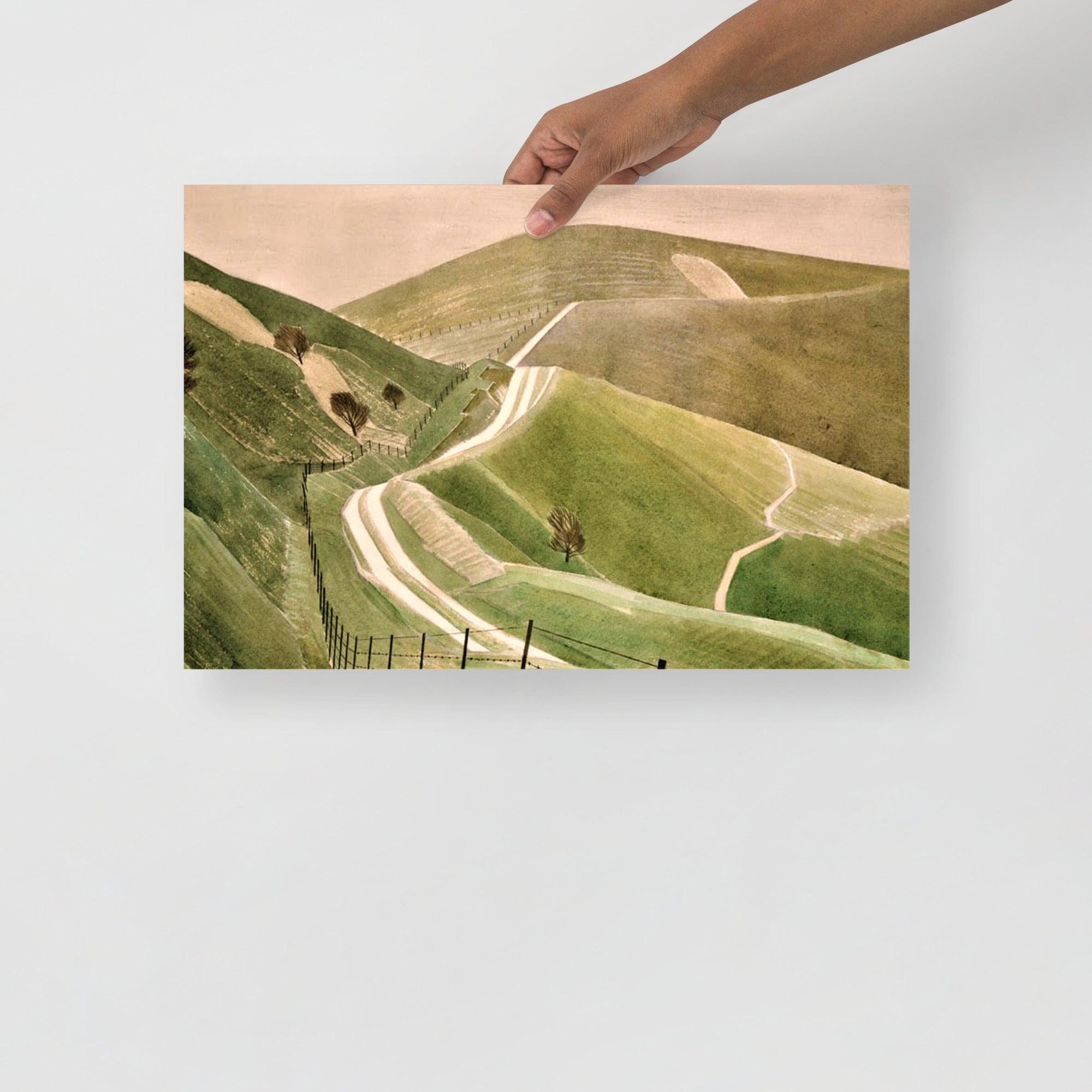 A Chalk Paths by Eric Ravilious poster on a plain backdrop in size 12x18”.