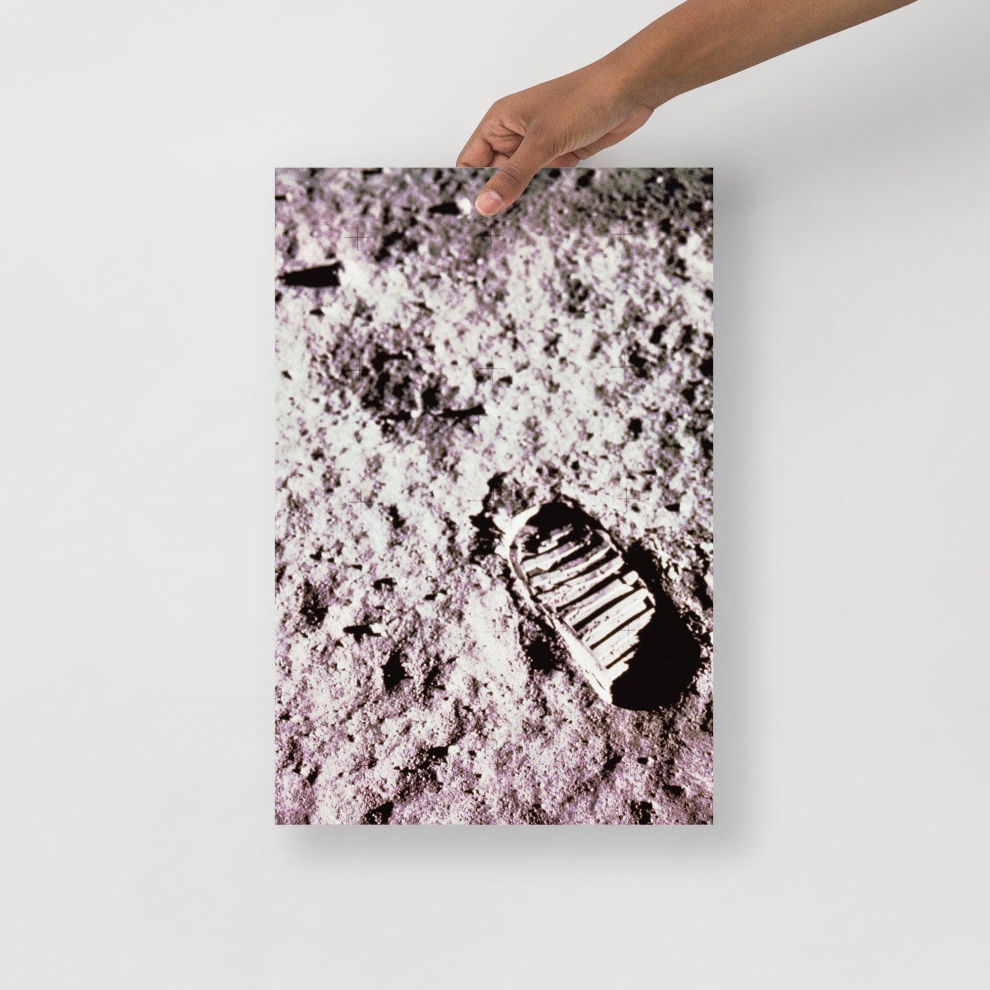 A Footprint on the Moon Apollo 11 poster on a plain backdrop in size 12x18”.