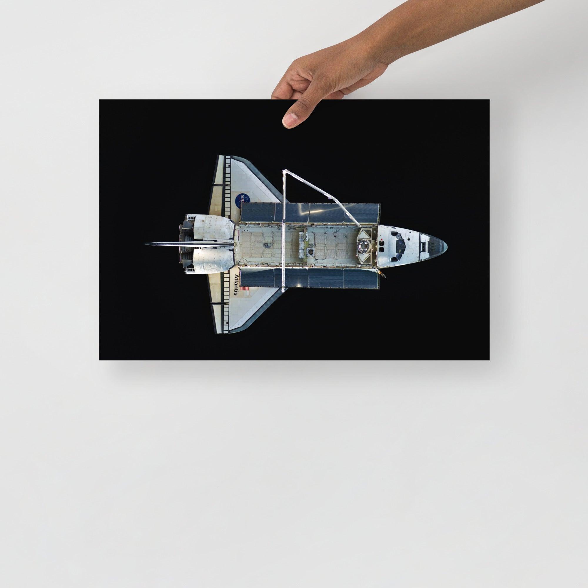 A Space Shuttle Atlantis poster on a plain backdrop in size 12x18”.