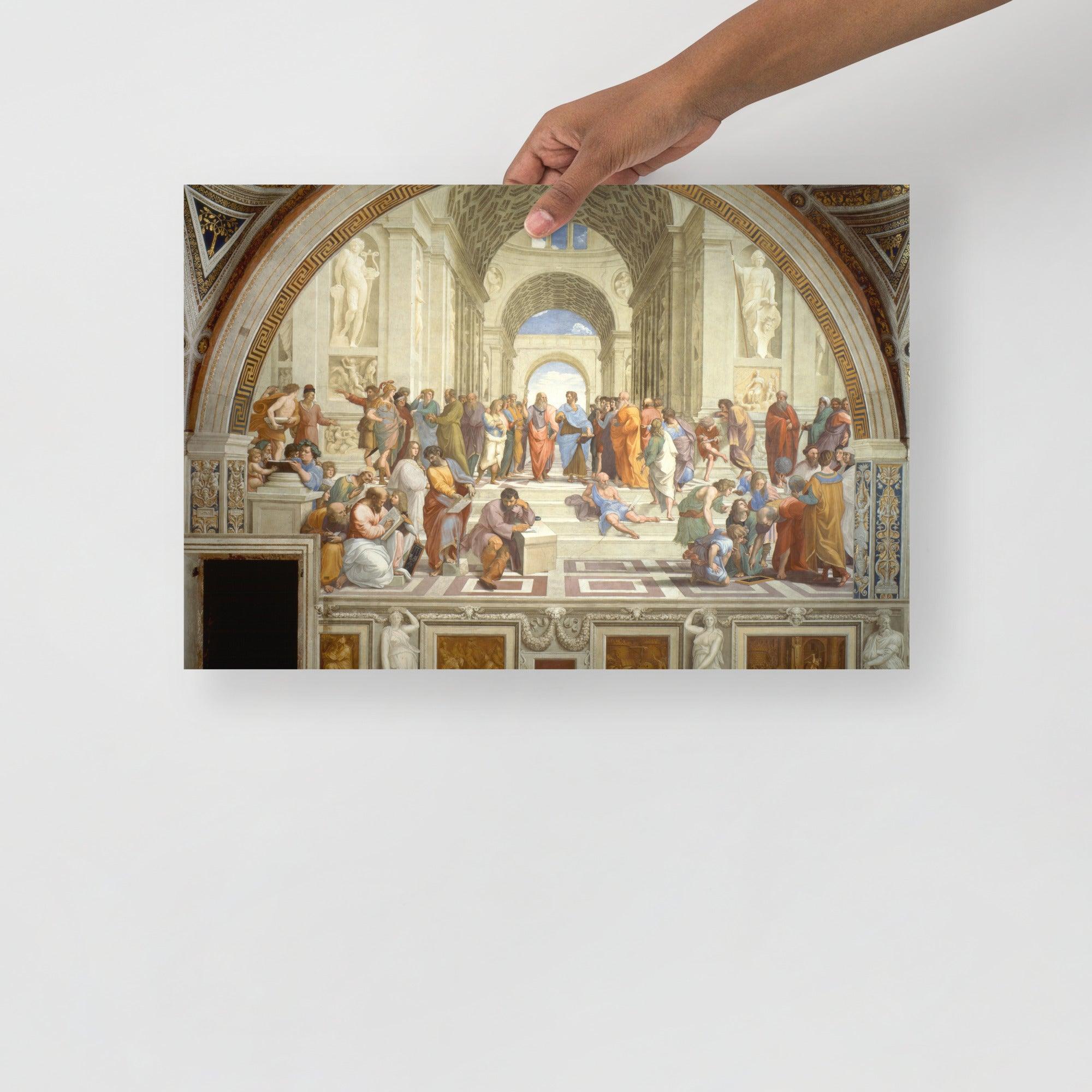 The School of Athens by Raphael poster on a plain backdrop in size 12x18”.