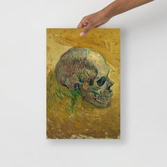 A Skull 1887 by Vincent Van Gogh poster on a plain backdrop in size 12x18”.