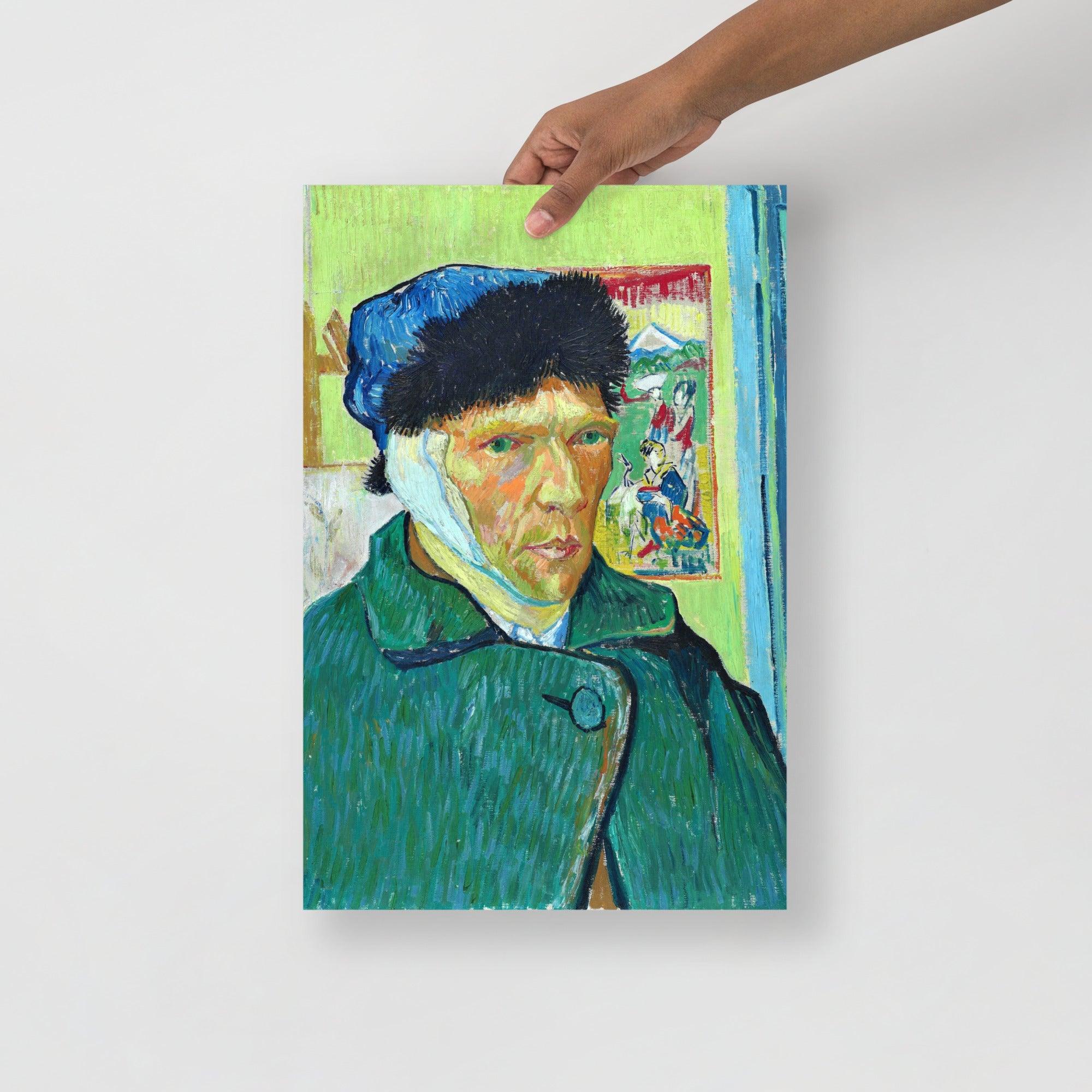 A Self Portrait With Bandaged Ear by Vincent Van Gogh poster on a plain backdrop in size 12x18”.