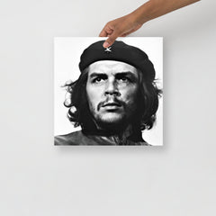 A Che Guevara poster on a plain backdrop in size 14x14”.