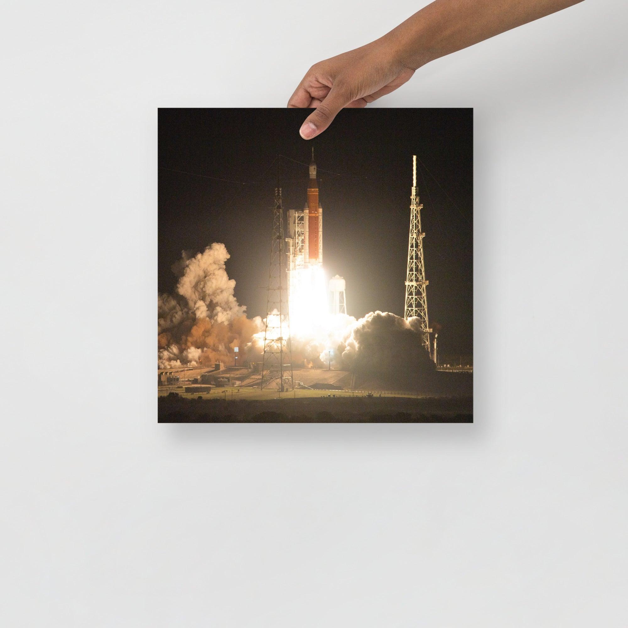 An Artemis 1 poster on a plain backdrop in size 14x14”.