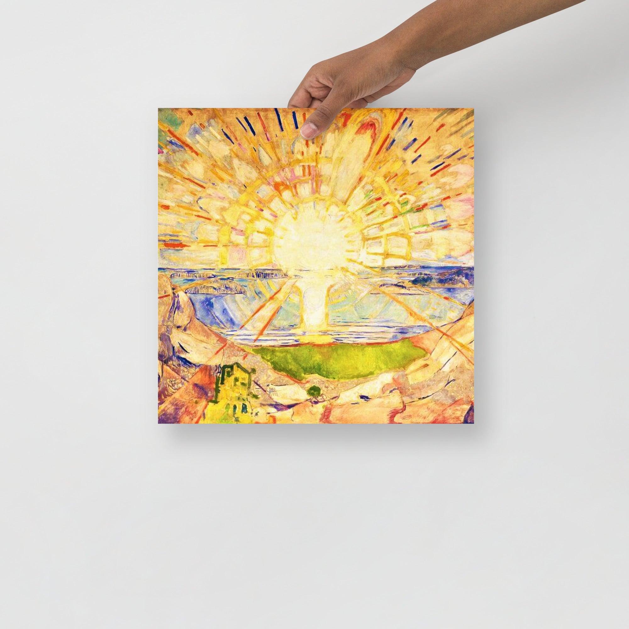 The Sun By Edvard Munch poster on a plain backdrop in size 14x14”.