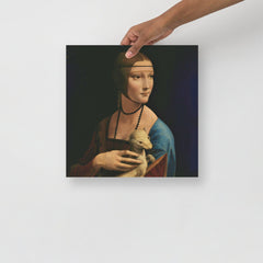 The Lady with the Ermine by Leonardo Da Vinci poster on a plain backdrop in size 14x14”.