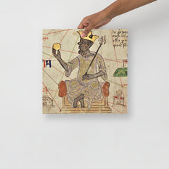 A Mansa Musa poster on a plain backdrop in size 14x14”.