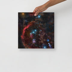 An Orion Constellation poster on a plain backdrop in size 14x14”.