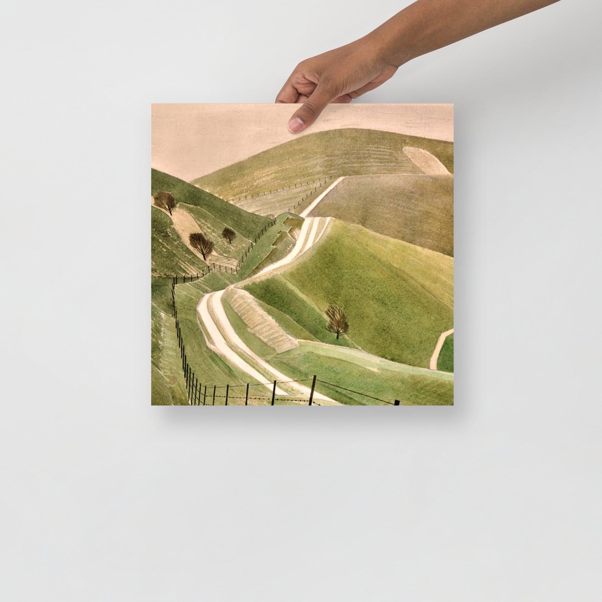 A Chalk Paths by Eric Ravilious poster on a plain backdrop in size 14x14”.
