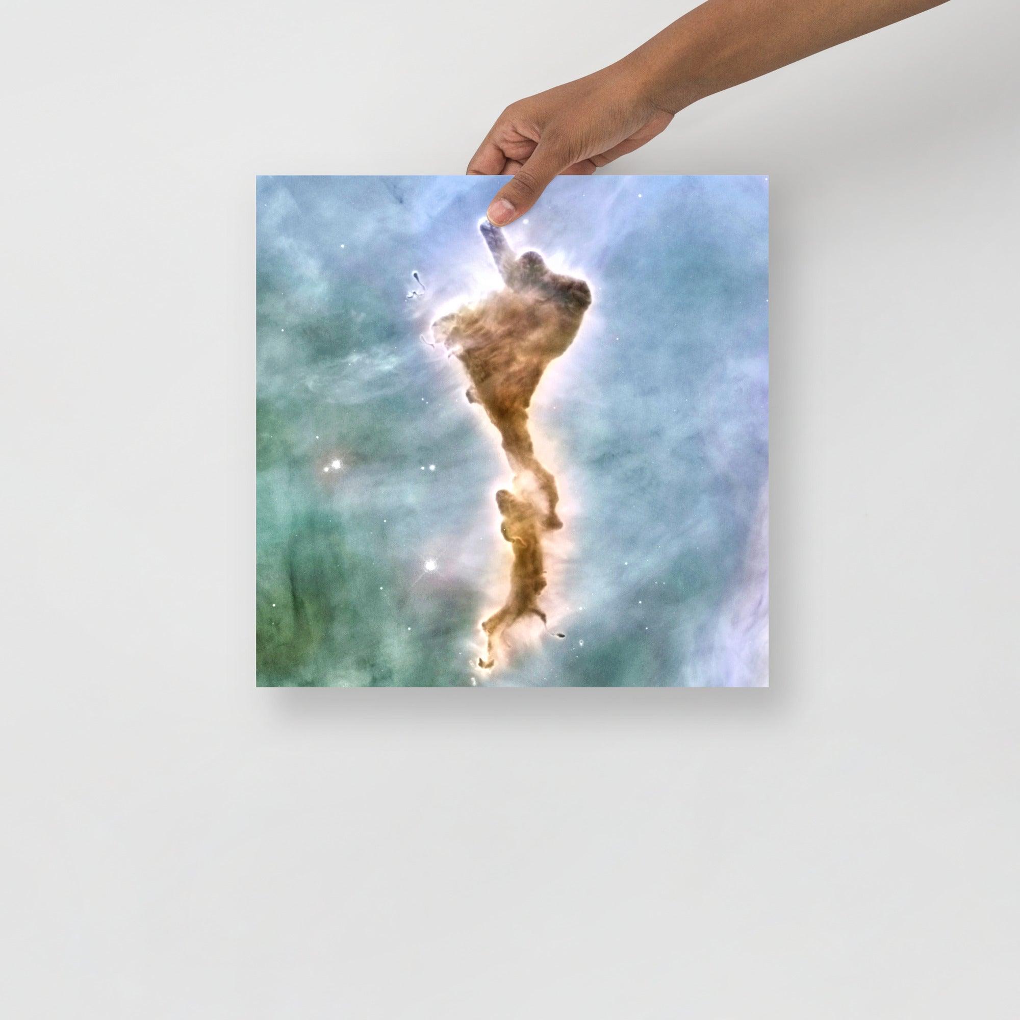 A Finger of God (Carina Nebula) poster on a plain backdrop in size 14x14”.