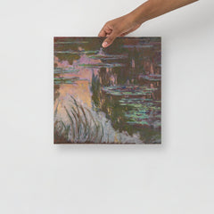 A Water Lilies by Claude Monet poster on a plain backdrop in size 14x14”.