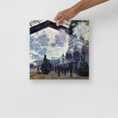 The Gare St-Lazare by Claude Monet  poster on a plain backdrop in size 14x14”.