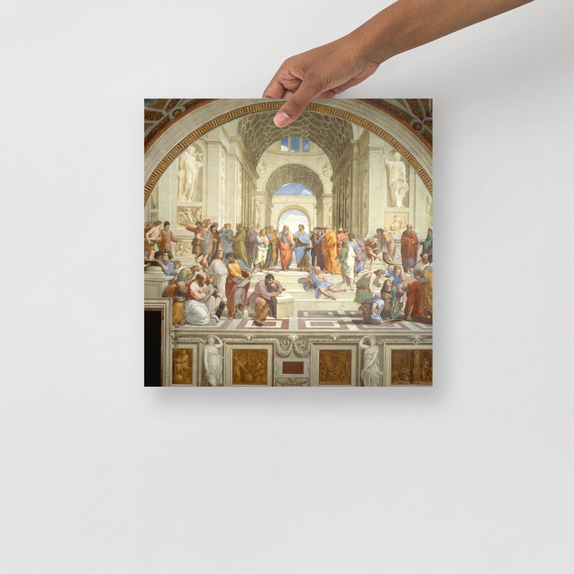 The School of Athens by Raphael poster on a plain backdrop in size 14x14”.