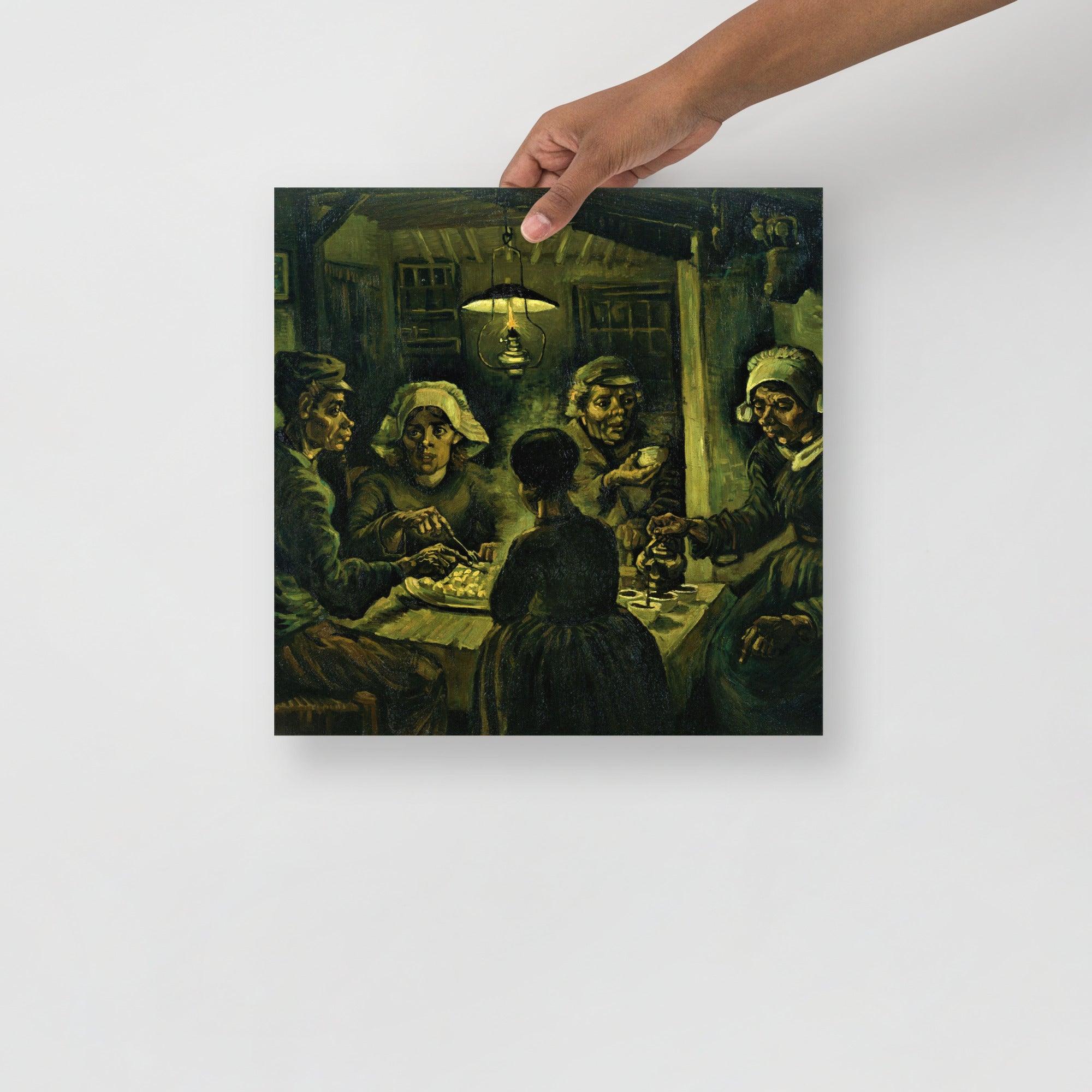 The Potato Eaters by Vincent van Gogh poster on a plain backdrop in size 14x14”.