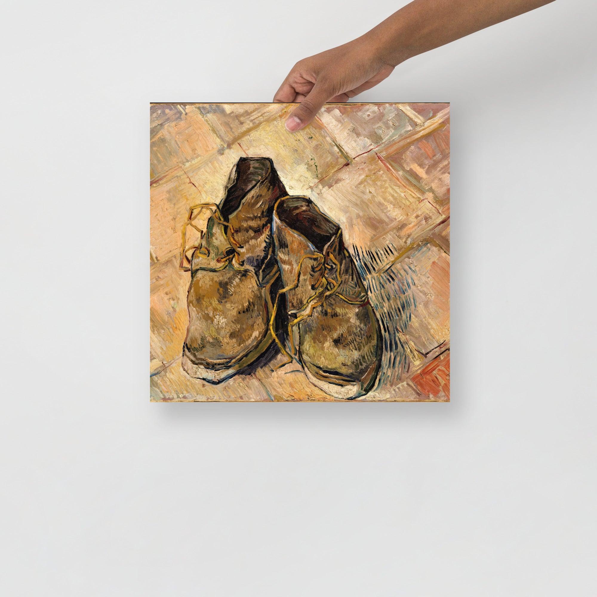 A Shoes by Vincent Van Gogh poster on a plain backdrop in size 14x14”.