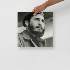 A Fidel Castro poster on a plain backdrop in size 14x14”.