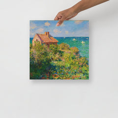 A Fisherman's Cottage at Varengeville by Claude Monet poster on a plain backdrop in size 14x14”.