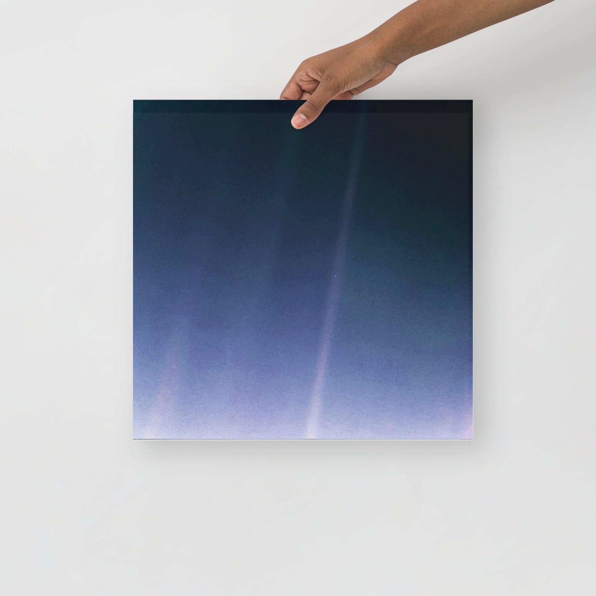 A Pale Blue Dot poster on a plain backdrop in size 16x16”.