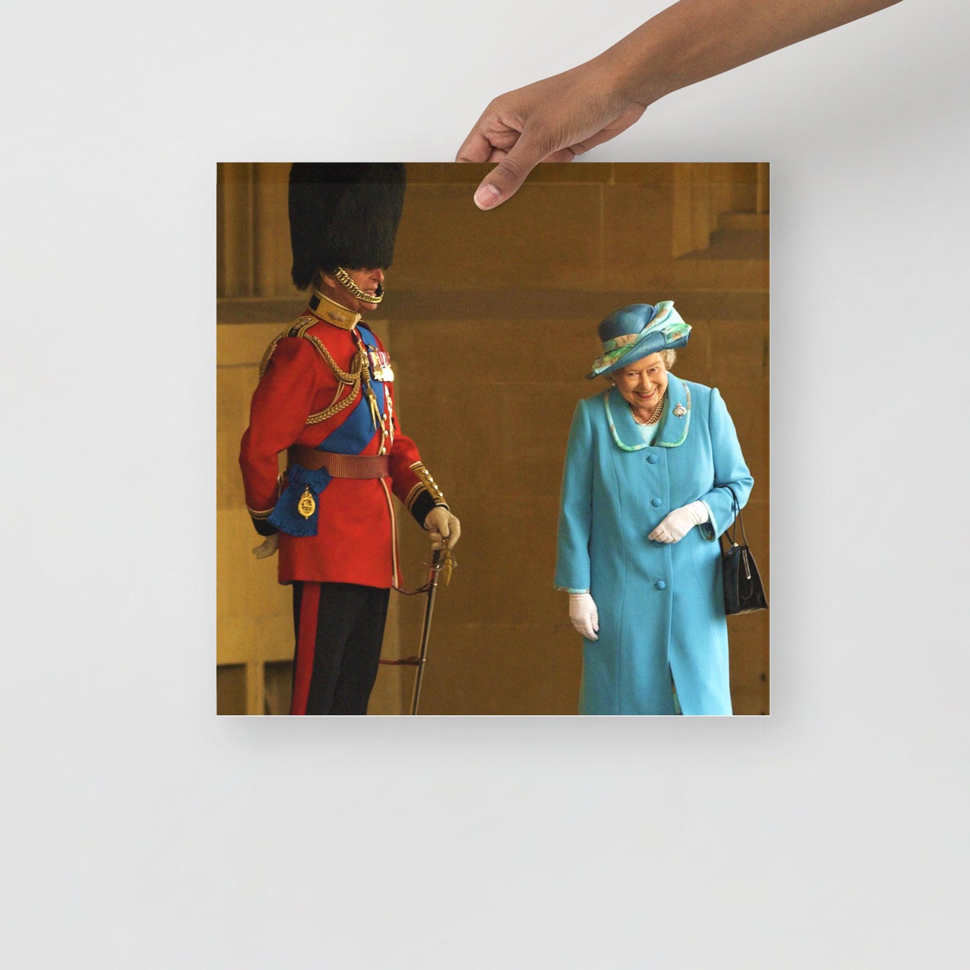 A Queen Elizabeth II with Prince Philip poster on a plain backdrop in size 16x16”.