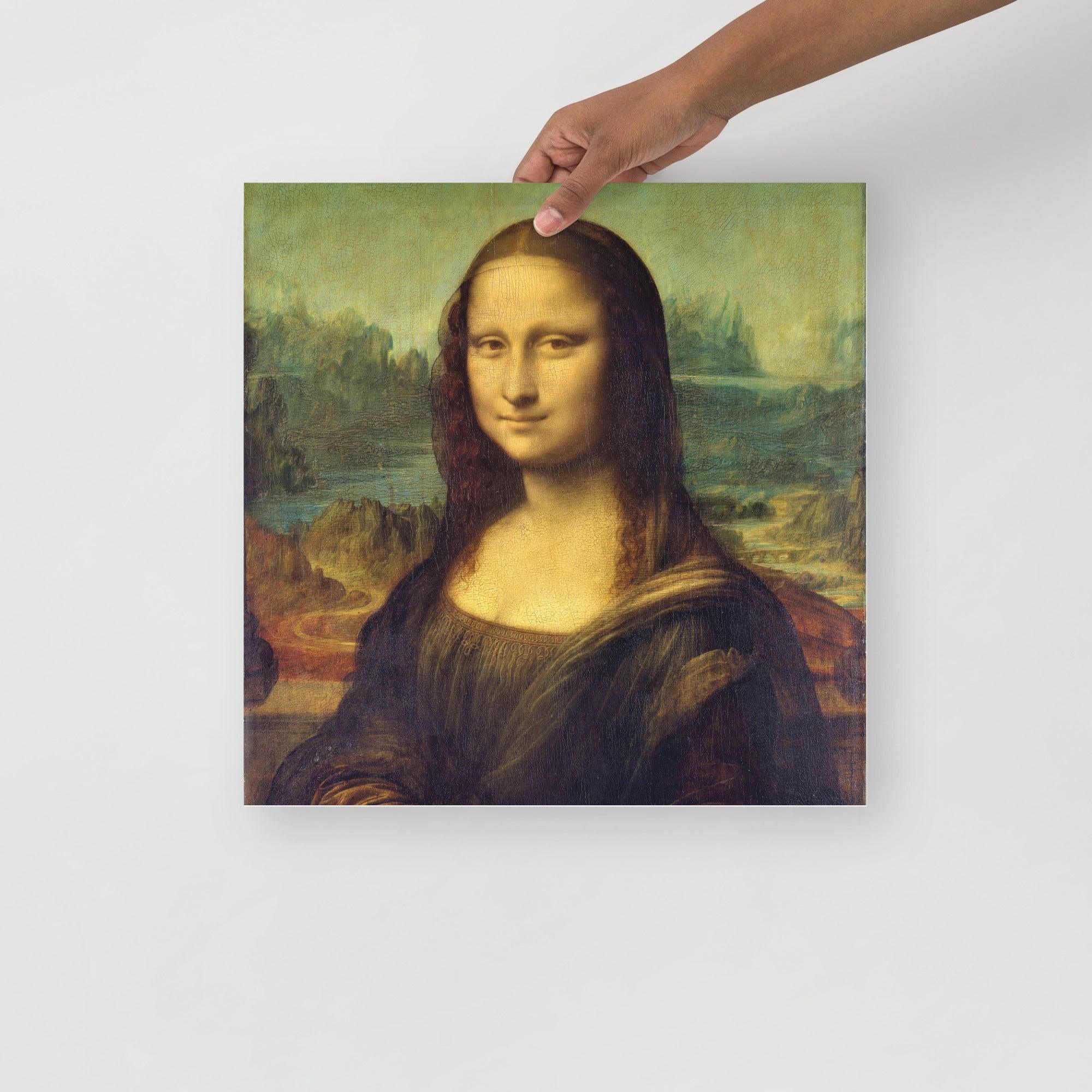 A Mona Lisa by Leonardo Da Vinci poster on a plain backdrop in size 16x16”.