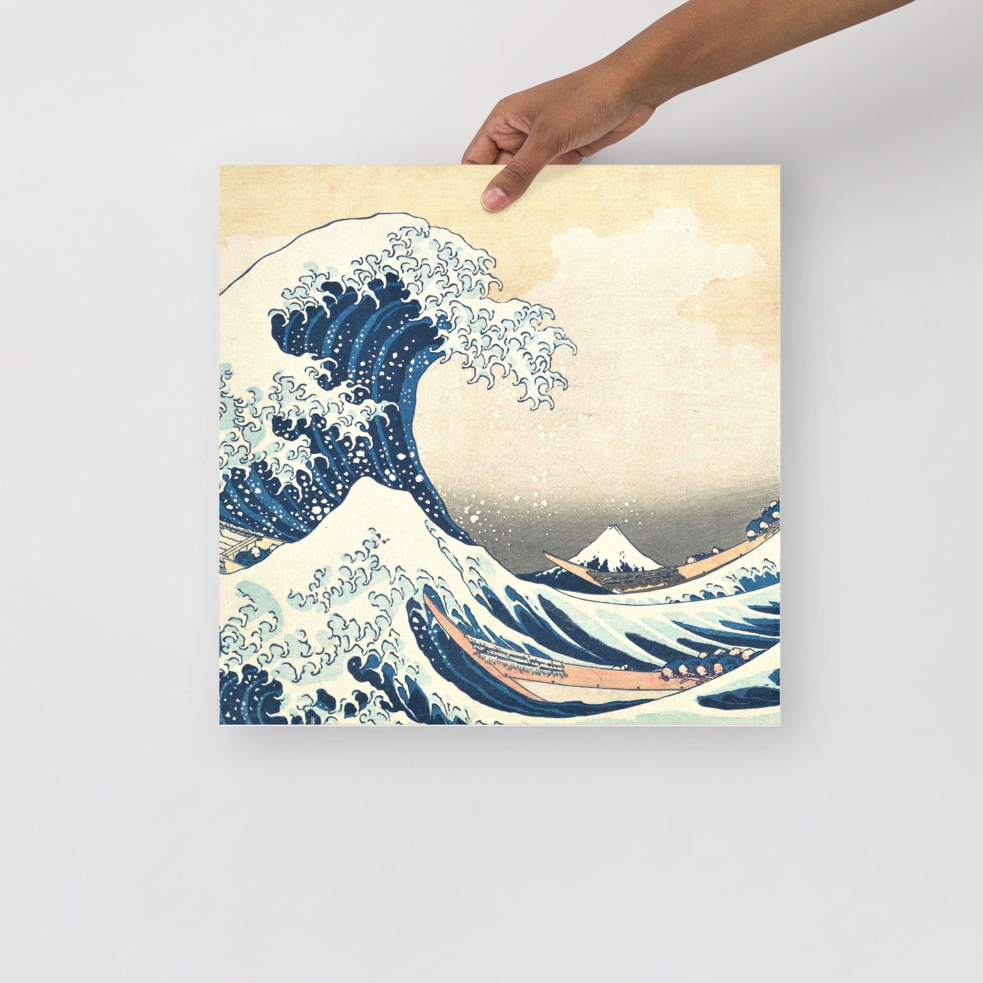 The Great Wave off Kanagawa by Hokusai poster on a plain backdrop in size 16x16”.