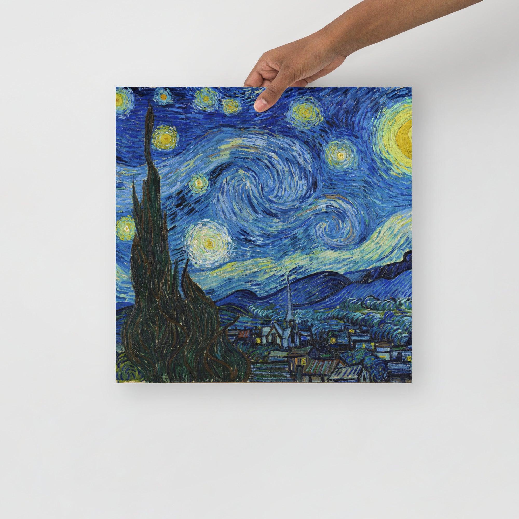 A The Starry Night by Vincent van Gogh poster on a plain backdrop in size 16x16”.