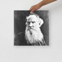 A Leo Tolstoy poster on a plain backdrop in size 16x16”.