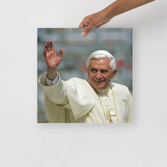 A Pope Benedict XVI poster on a plain backdrop in size 16x16”.