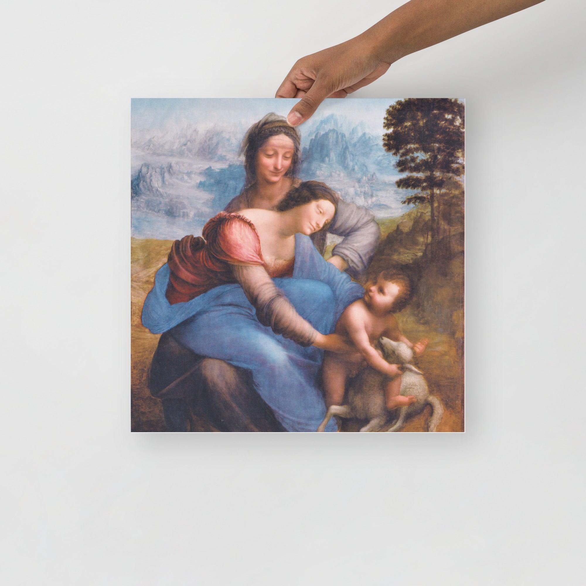 The Virgin and Child with Saint Anne by Leonardo da Vinci poster on a plain backdrop in size 16x16”.