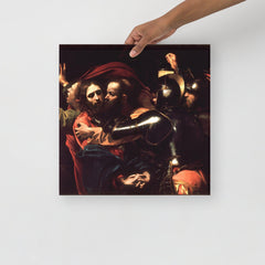 The Taking of Christ by Caravaggio poster on a plain backdrop in size 16x16”.